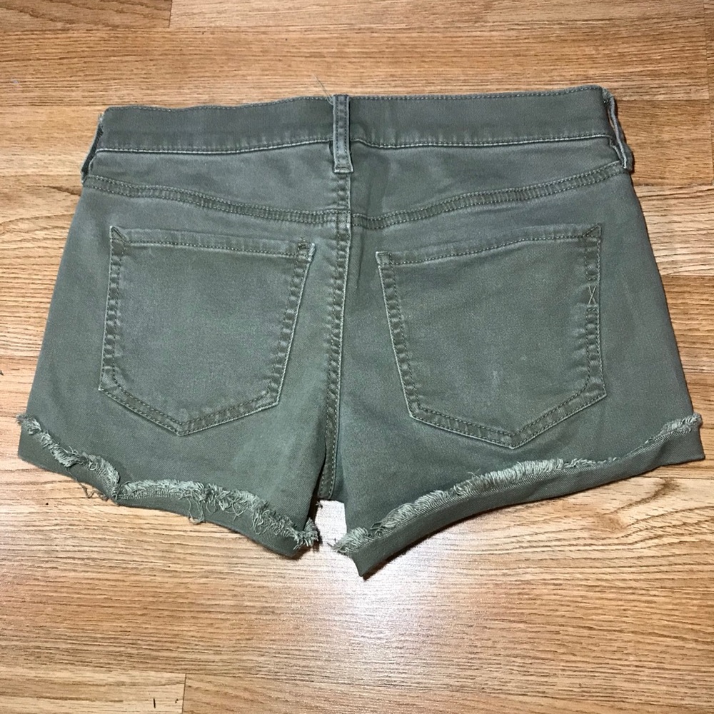 Express green denim booty shorts